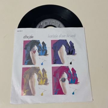 Elton John – Heartache All Over The World