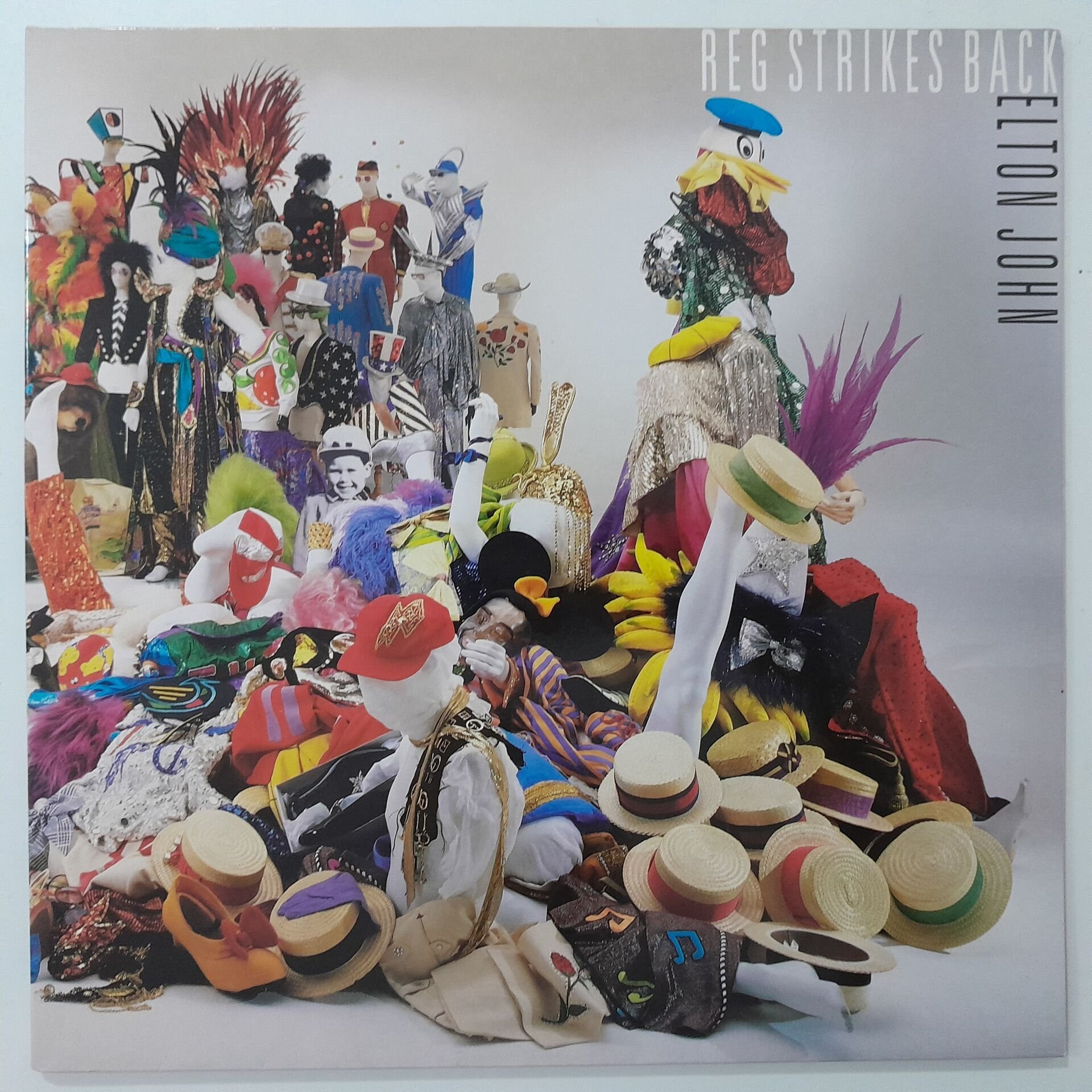 Elton John ‎– Reg Strikes Back