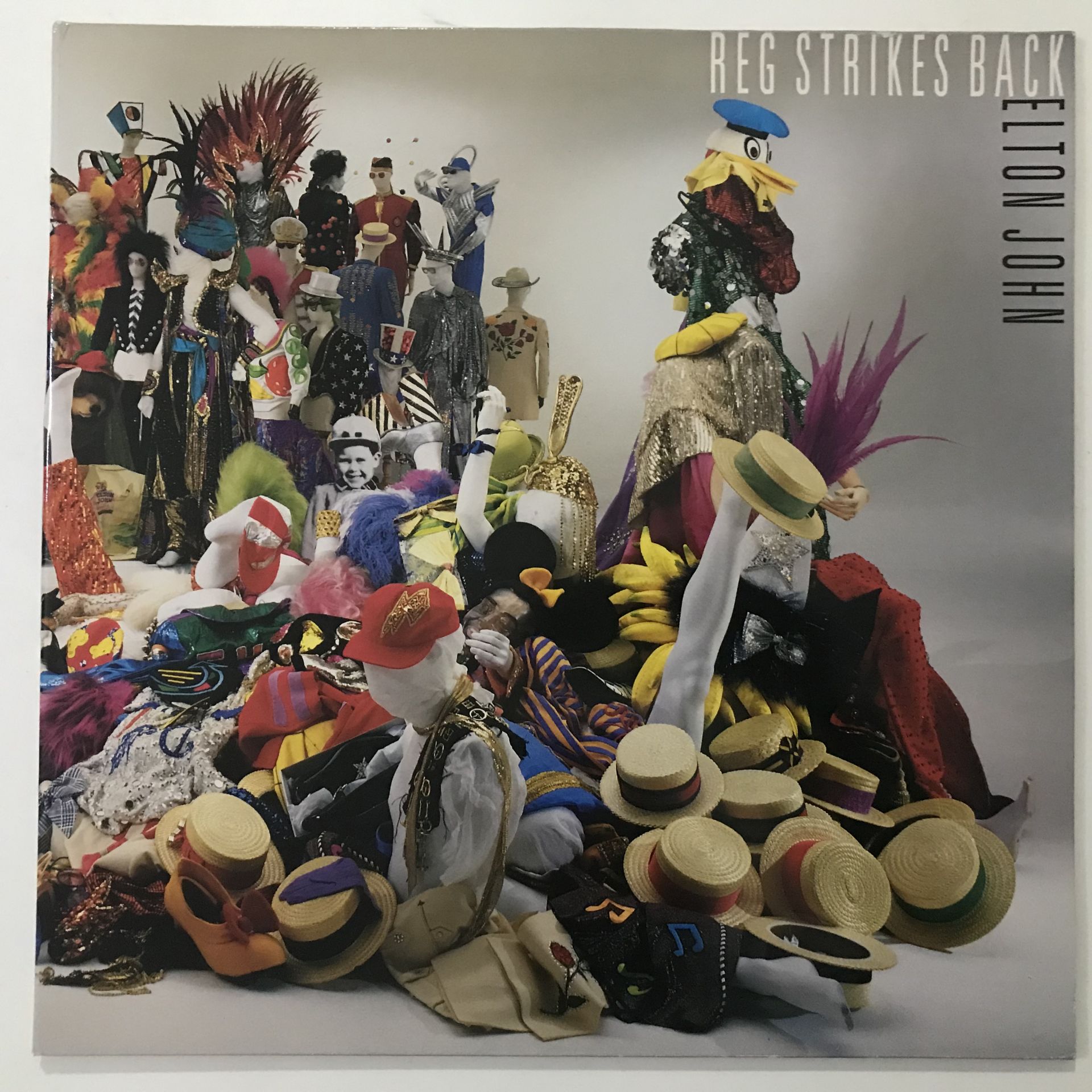 Elton John ‎– Reg Strikes Back