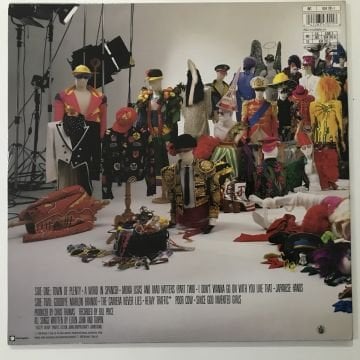 Elton John ‎– Reg Strikes Back