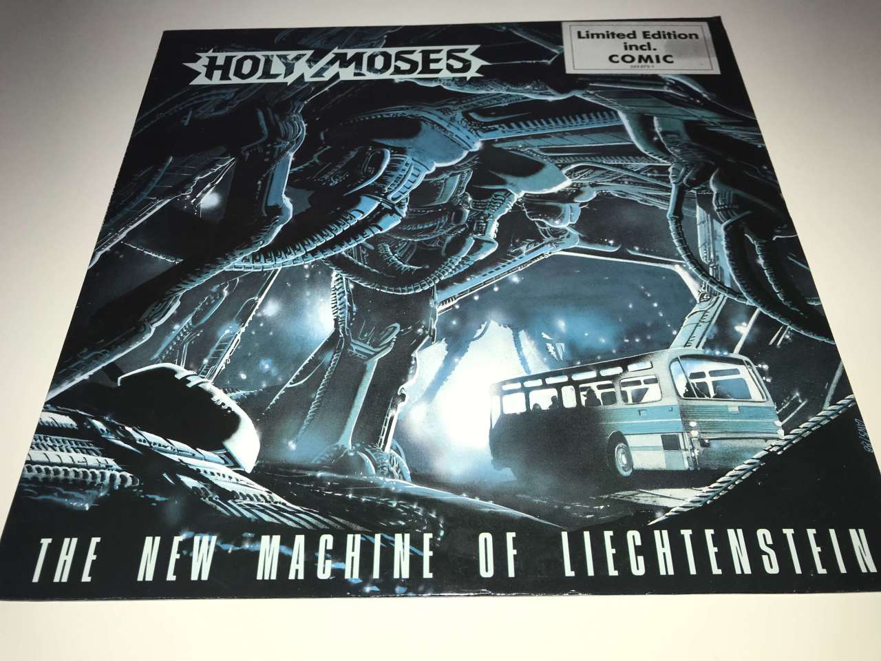 Holy Moses ‎– The New Machine Of Liechtenstein (Kartpostal ve Çizgi Roman Kitapçıklı)