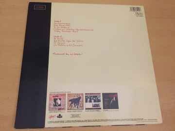 Los Lobos ‎– La Pistola Y El Corazón