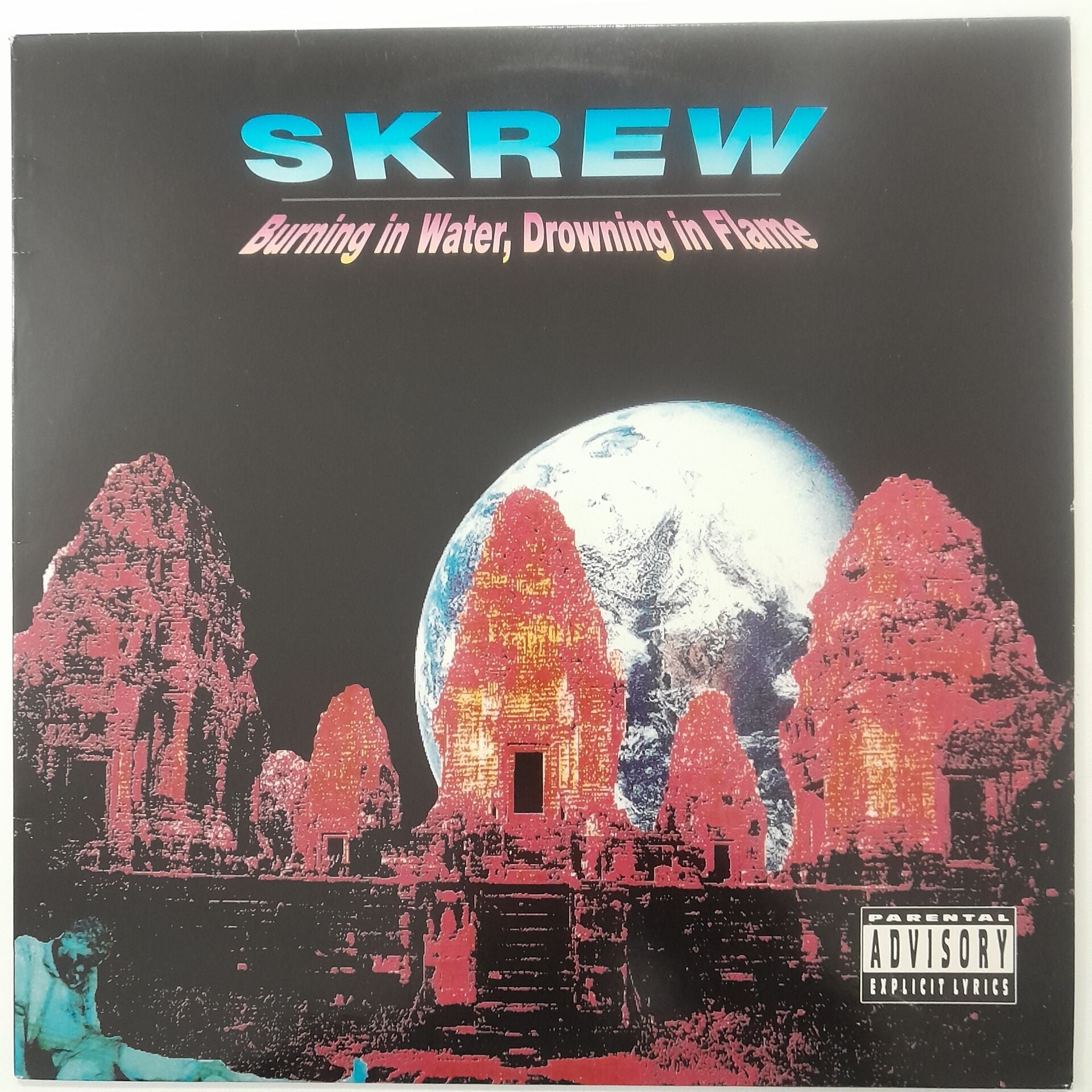 Skrew – Burning In Water, Drowning In Flame