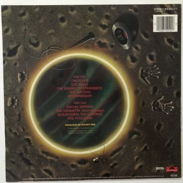 Saga ‎– Heads Or Tales