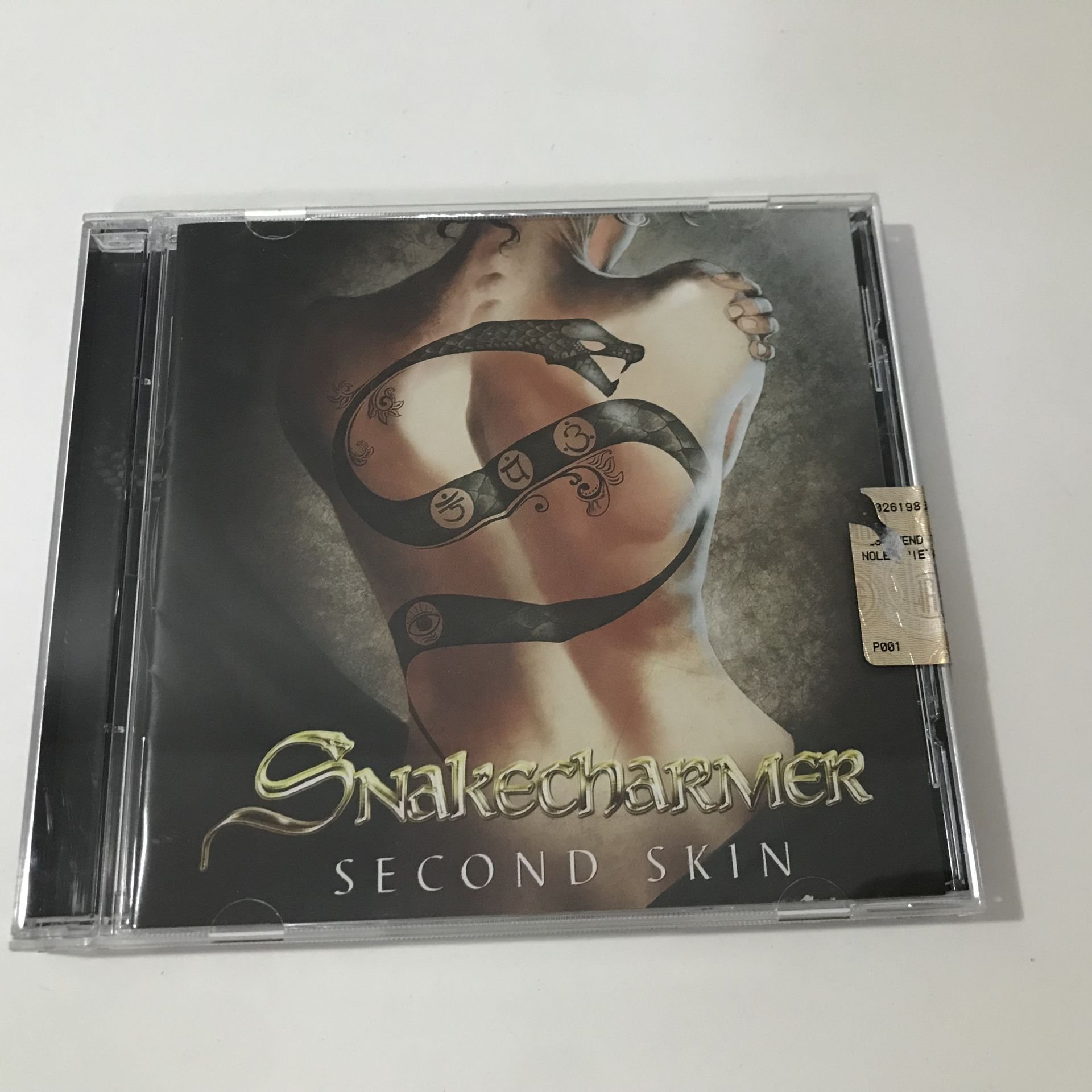 Snakecharmer – Second Skin