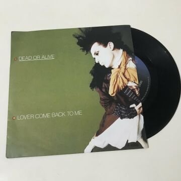 Dead Or Alive – You Spin Me Round (Like A Record)