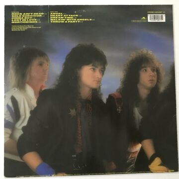 Heavy Pettin ‎– Rock Ain't Dead
