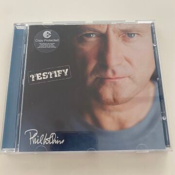 Phil Collins – Testify