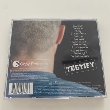 Phil Collins – Testify