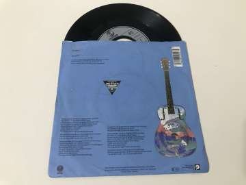 Dire Straits – Walk Of Life