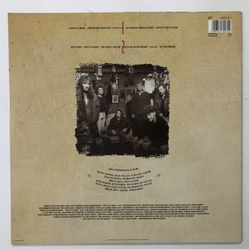 REO Speedwagon – The Earth A Small Man His Dog And A Chicken