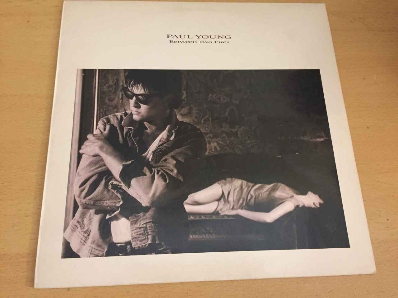 Paul Young ‎– Between Two Fires