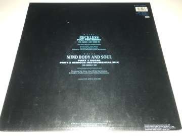 Afrika Bambaataa & Family Featuring UB40 ‎– Reckless