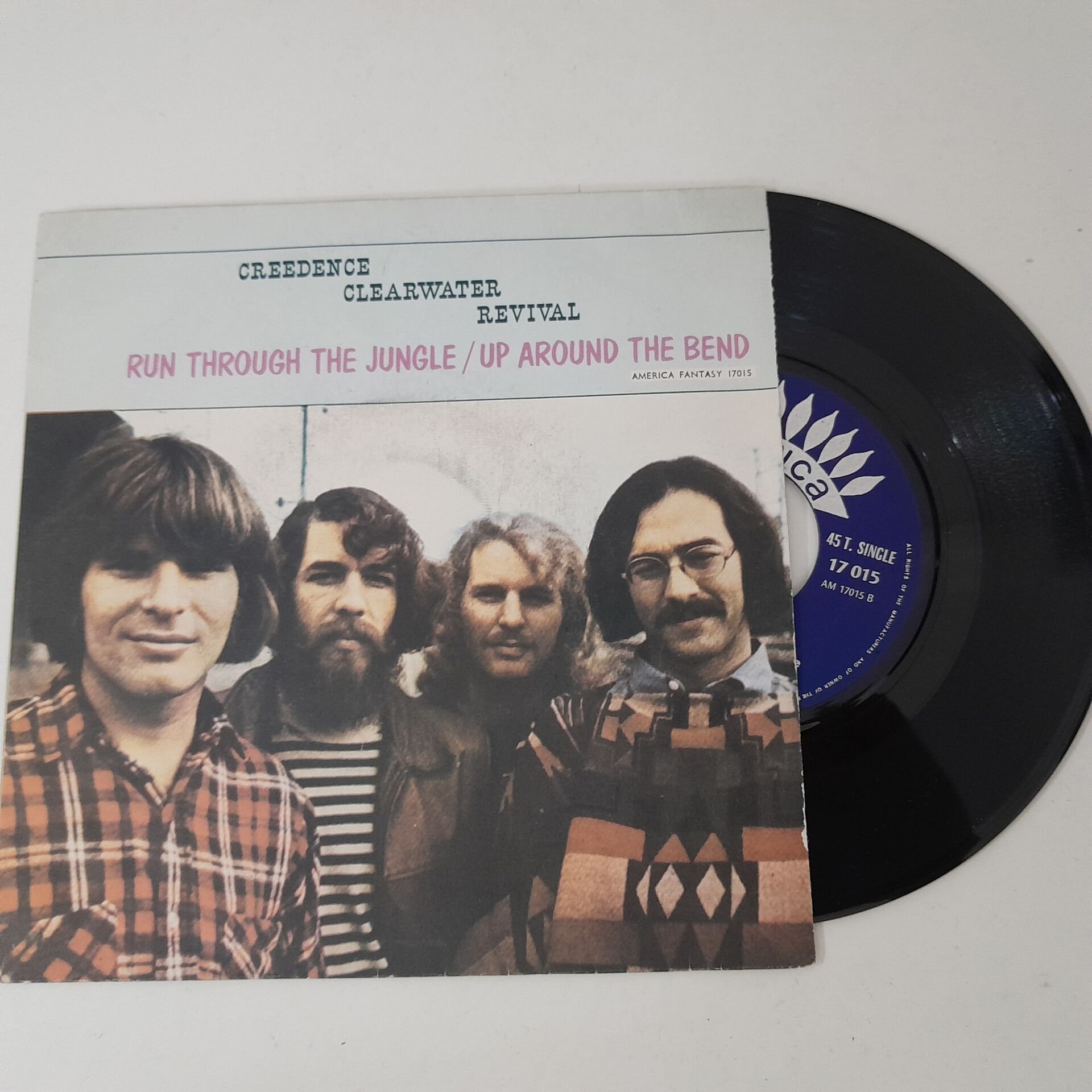 Creedence Clearwater Revival – Run Through The Jungle / Up Around The Bend