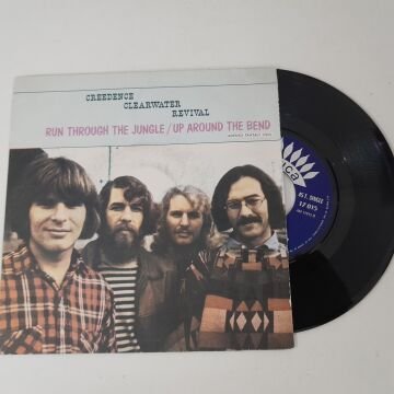 Creedence Clearwater Revival – Run Through The Jungle / Up Around The Bend